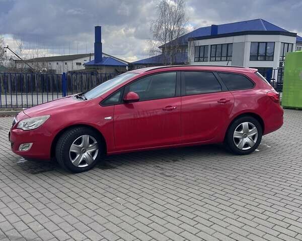 Красный Опель Астра, объемом двигателя 1.69 л и пробегом 220 тыс. км за 6600 $, фото 1 на Automoto.ua