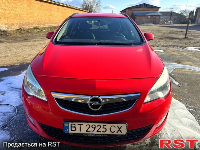 Червоний Опель Астра, об'ємом двигуна 1.2 л та пробігом 172 тис. км за 6400 $, фото 1 на Automoto.ua