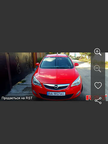Красный Опель Астра, объемом двигателя 1.25 л и пробегом 240 тыс. км за 6300 $, фото 1 на Automoto.ua