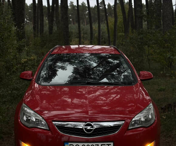 Красный Опель Астра, объемом двигателя 1.7 л и пробегом 275 тыс. км за 6000 $, фото 1 на Automoto.ua