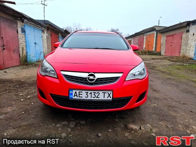 Красный Опель Астра, объемом двигателя 1.4 л и пробегом 230 тыс. км за 6500 $, фото 1 на Automoto.ua