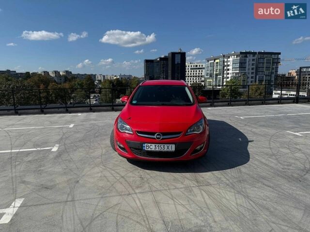 Красный Опель Астра, объемом двигателя 1.4 л и пробегом 204 тыс. км за 6590 $, фото 1 на Automoto.ua
