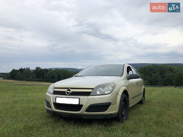 Желтый Опель Астра, объемом двигателя 1.7 л и пробегом 185 тыс. км за 4000 $, фото 1 на Automoto.ua