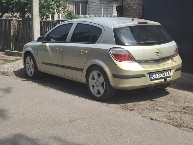 Желтый Опель Астра, объемом двигателя 1.7 л и пробегом 390 тыс. км за 4200 $, фото 1 на Automoto.ua