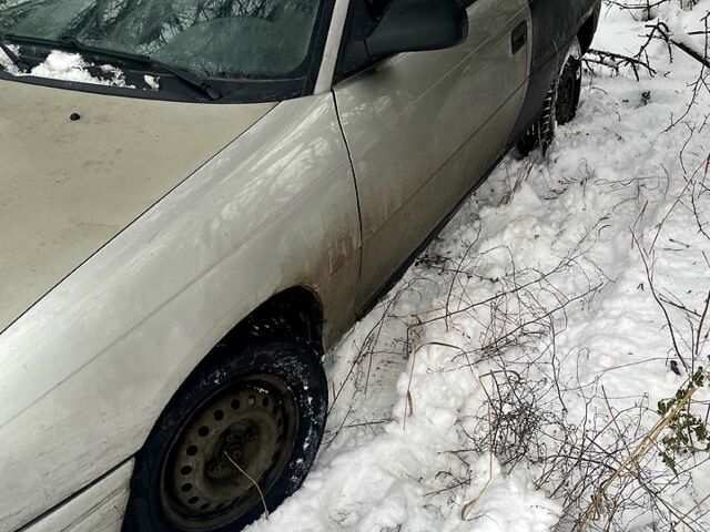 Серый Опель Астра, объемом двигателя 1.4 л и пробегом 400 тыс. км за 1290 $, фото 1 на Automoto.ua