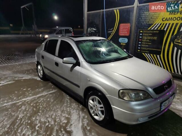 Серый Опель Астра, объемом двигателя 1.6 л и пробегом 293 тыс. км за 3000 $, фото 1 на Automoto.ua