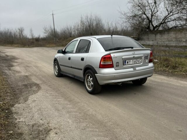 Серый Опель Астра, объемом двигателя 1.6 л и пробегом 240 тыс. км за 870 $, фото 1 на Automoto.ua