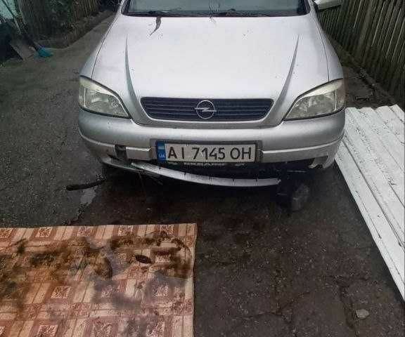 Серый Опель Астра, объемом двигателя 1.6 л и пробегом 250 тыс. км за 1300 $, фото 1 на Automoto.ua