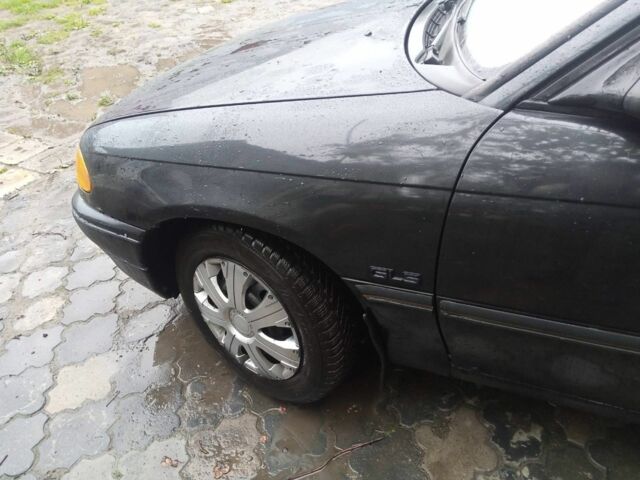 Серый Опель Астра, объемом двигателя 2 л и пробегом 466 тыс. км за 1600 $, фото 1 на Automoto.ua