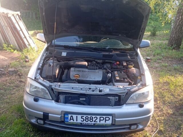 Серый Опель Астра, объемом двигателя 1.6 л и пробегом 337 тыс. км за 1771 $, фото 1 на Automoto.ua