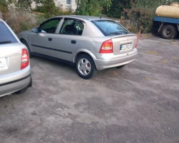 Серый Опель Астра, объемом двигателя 1.6 л и пробегом 337 тыс. км за 1771 $, фото 1 на Automoto.ua