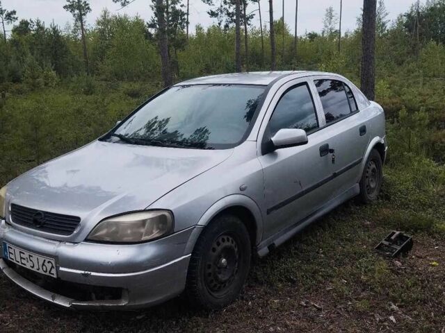 Серый Опель Астра, объемом двигателя 2 л и пробегом 260 тыс. км за 600 $, фото 1 на Automoto.ua