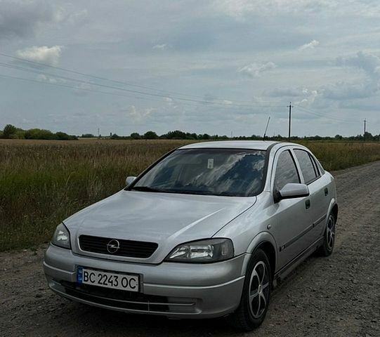 Сірий Опель Астра, об'ємом двигуна 1.69 л та пробігом 332 тис. км за 1999 $, фото 1 на Automoto.ua