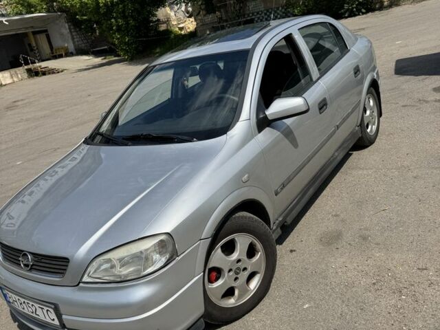 Серый Опель Астра, объемом двигателя 1.6 л и пробегом 301 тыс. км за 3400 $, фото 1 на Automoto.ua