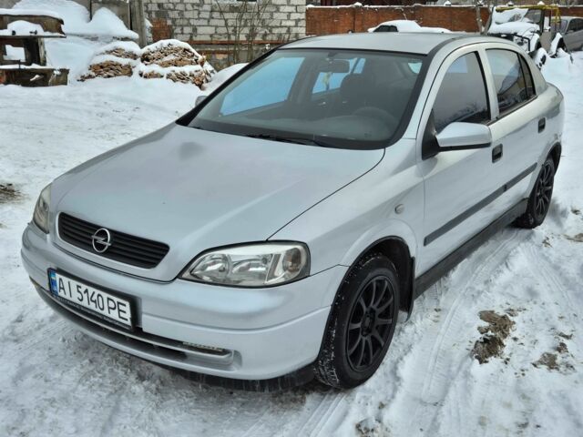 Серый Опель Астра, объемом двигателя 1.2 л и пробегом 230 тыс. км за 2250 $, фото 1 на Automoto.ua