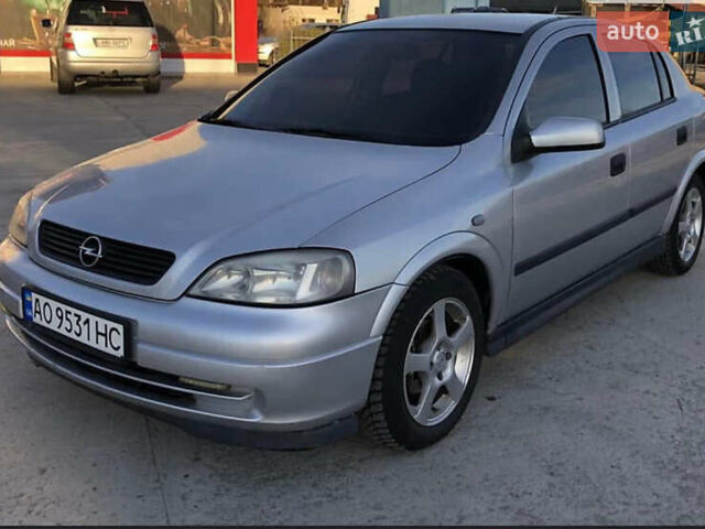 Серый Опель Астра, объемом двигателя 1.6 л и пробегом 244 тыс. км за 3000 $, фото 1 на Automoto.ua