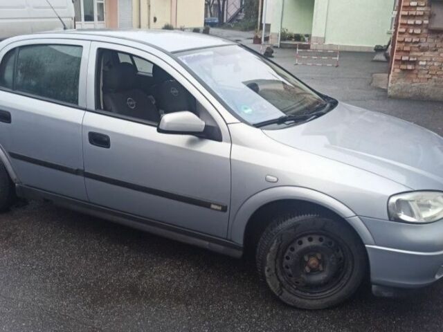 Серый Опель Астра, объемом двигателя 1.6 л и пробегом 214 тыс. км за 3200 $, фото 1 на Automoto.ua