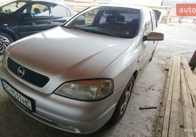 Серый Опель Астра, объемом двигателя 1.6 л и пробегом 255 тыс. км за 2500 $, фото 1 на Automoto.ua