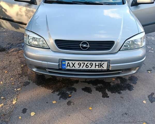 Серый Опель Астра, объемом двигателя 1.4 л и пробегом 250 тыс. км за 4800 $, фото 1 на Automoto.ua