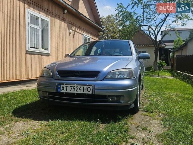 Серый Опель Астра, объемом двигателя 1.4 л и пробегом 253 тыс. км за 2550 $, фото 1 на Automoto.ua