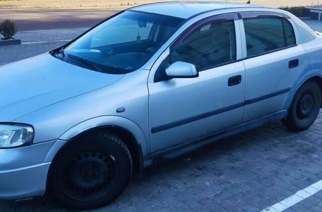 Серый Опель Астра, объемом двигателя 0 л и пробегом 254 тыс. км за 2050 $, фото 1 на Automoto.ua