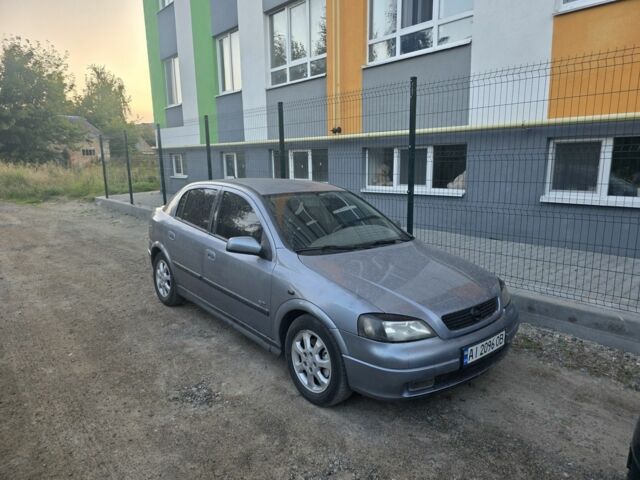 Серый Опель Астра, объемом двигателя 2 л и пробегом 297 тыс. км за 2900 $, фото 1 на Automoto.ua