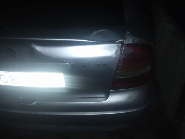 Серый Опель Астра, объемом двигателя 1.6 л и пробегом 280 тыс. км за 1450 $, фото 1 на Automoto.ua