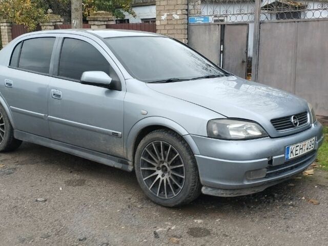 Серый Опель Астра, объемом двигателя 2 л и пробегом 245 тыс. км за 1200 $, фото 1 на Automoto.ua