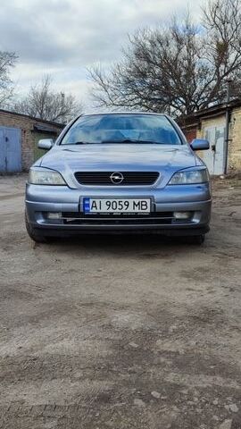 Серый Опель Астра, объемом двигателя 1.39 л и пробегом 330 тыс. км за 3400 $, фото 1 на Automoto.ua