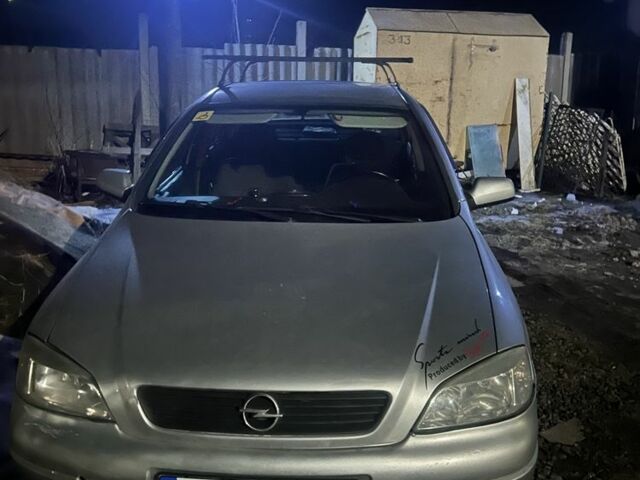 Серый Опель Астра, объемом двигателя 1.4 л и пробегом 300 тыс. км за 2600 $, фото 1 на Automoto.ua