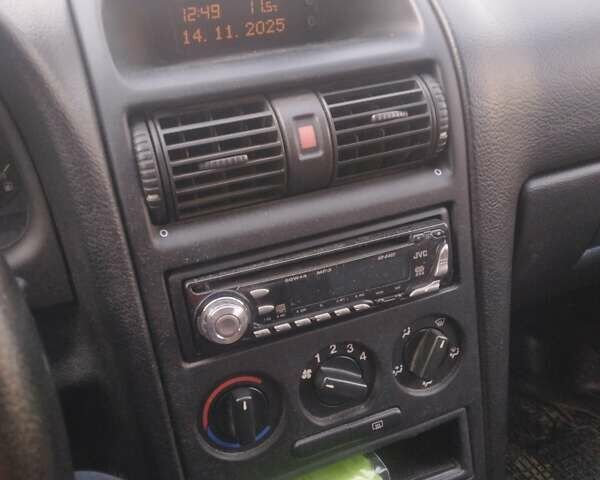 Серый Опель Астра, объемом двигателя 1.36 л и пробегом 202 тыс. км за 3200 $, фото 1 на Automoto.ua