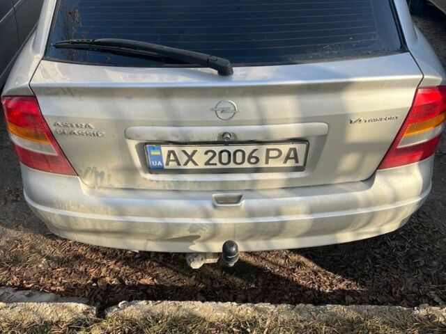 Серый Опель Астра, объемом двигателя 1.4 л и пробегом 200 тыс. км за 4000 $, фото 1 на Automoto.ua