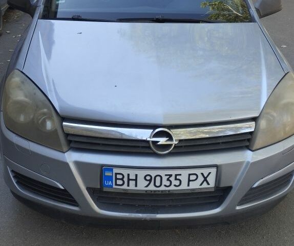 Серый Опель Астра, объемом двигателя 1.4 л и пробегом 247 тыс. км за 3500 $, фото 1 на Automoto.ua