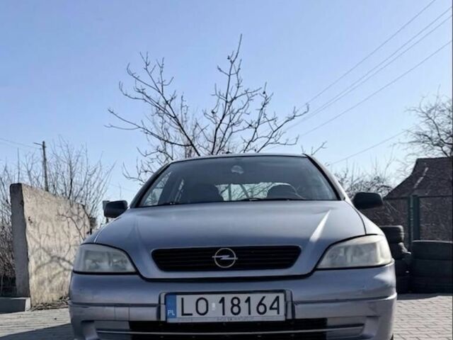 Серый Опель Астра, объемом двигателя 1.4 л и пробегом 126 тыс. км за 1350 $, фото 1 на Automoto.ua
