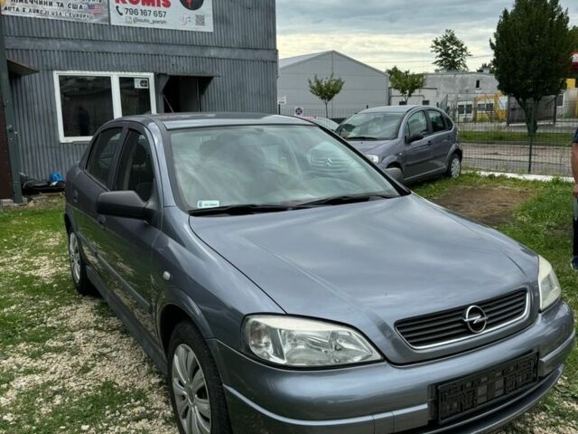 Серый Опель Астра, объемом двигателя 1.4 л и пробегом 300 тыс. км за 2200 $, фото 1 на Automoto.ua