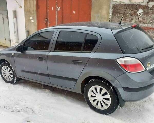 Серый Опель Астра, объемом двигателя 1.4 л и пробегом 468 тыс. км за 5000 $, фото 1 на Automoto.ua