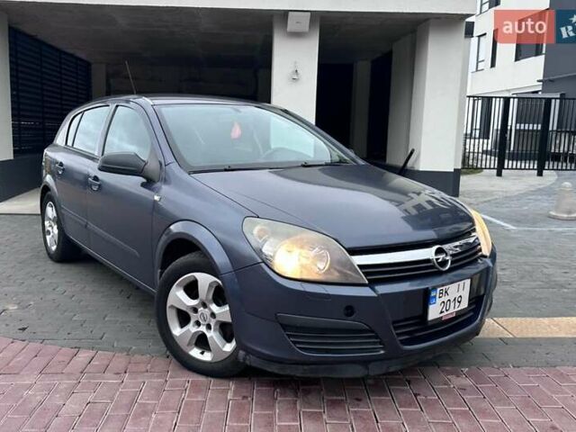 Серый Опель Астра, объемом двигателя 1.2 л и пробегом 274 тыс. км за 3399 $, фото 1 на Automoto.ua