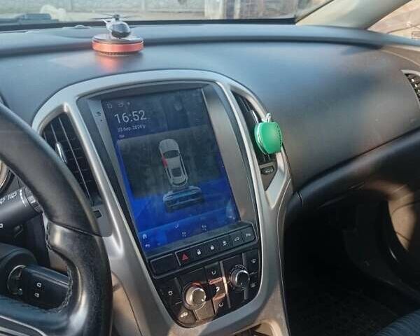 Серый Опель Астра, объемом двигателя 1.2 л и пробегом 266 тыс. км за 5300 $, фото 1 на Automoto.ua