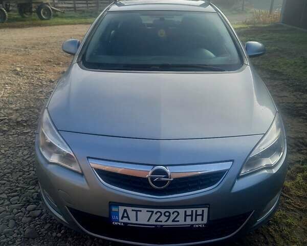 Серый Опель Астра, объемом двигателя 1.6 л и пробегом 207 тыс. км за 7500 $, фото 1 на Automoto.ua