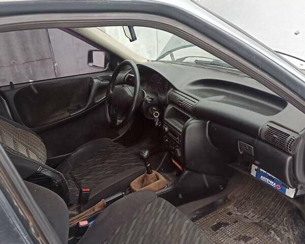 Сірий Опель Астра, об'ємом двигуна 1.8 л та пробігом 150 тис. км за 1600 $, фото 1 на Automoto.ua