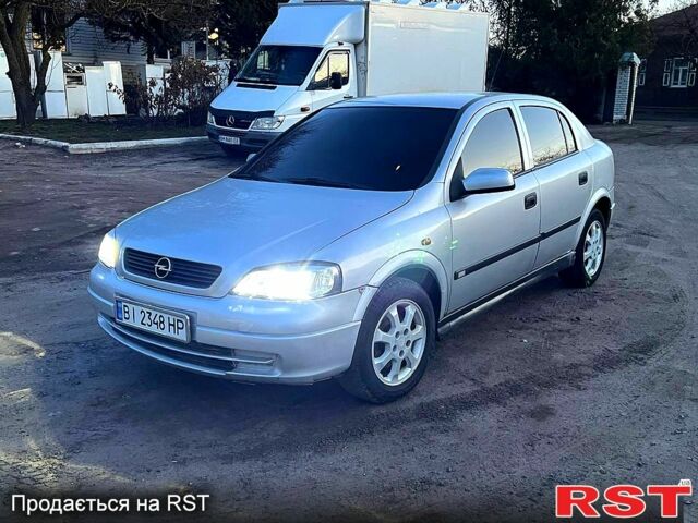 Серый Опель Астра, объемом двигателя 2 л и пробегом 343 тыс. км за 2600 $, фото 1 на Automoto.ua