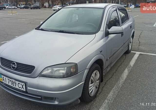 Серый Опель Астра, объемом двигателя 1.6 л и пробегом 235 тыс. км за 2500 $, фото 1 на Automoto.ua