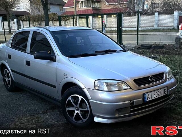 Серый Опель Астра, объемом двигателя 1.6 л и пробегом 340 тыс. км за 3450 $, фото 1 на Automoto.ua