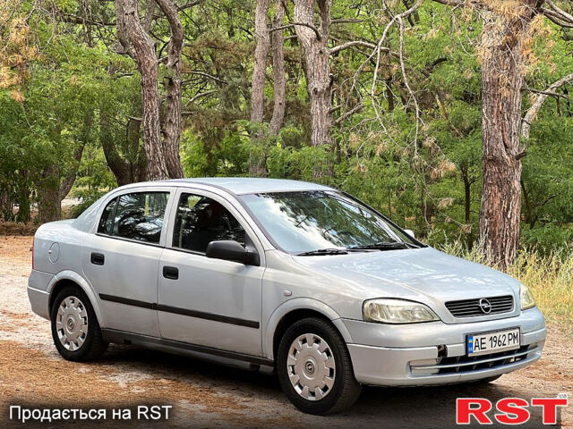Серый Опель Астра, объемом двигателя 1.4 л и пробегом 302 тыс. км за 2500 $, фото 1 на Automoto.ua