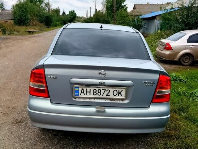 Серый Опель Астра, объемом двигателя 1.4 л и пробегом 174 тыс. км за 3000 $, фото 1 на Automoto.ua