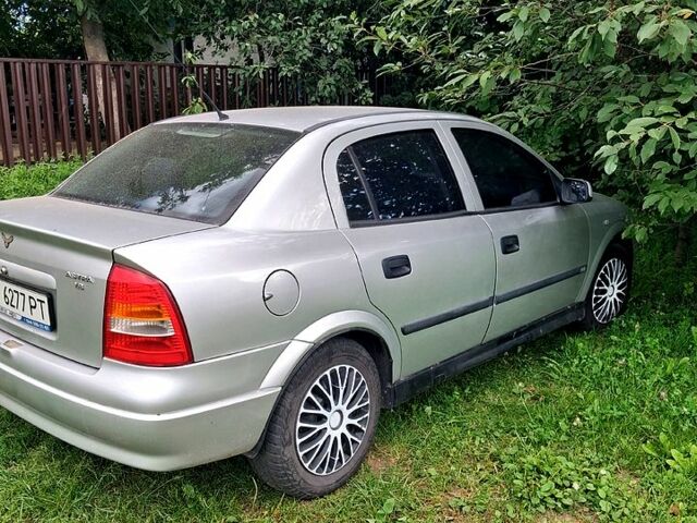 Серый Опель Астра, объемом двигателя 1.8 л и пробегом 303 тыс. км за 2500 $, фото 1 на Automoto.ua