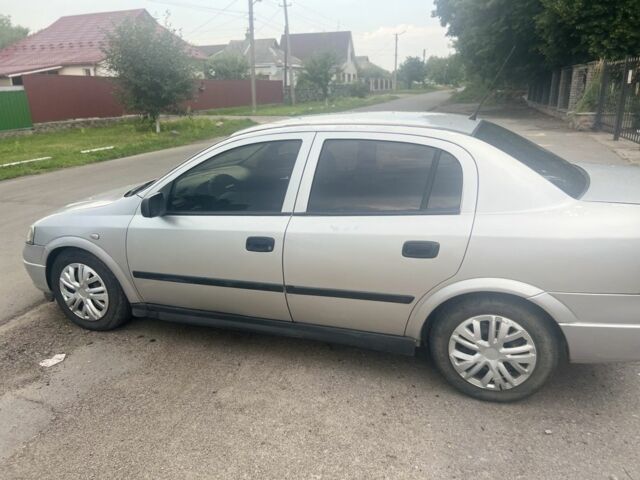 Серый Опель Астра, объемом двигателя 2 л и пробегом 292 тыс. км за 3000 $, фото 1 на Automoto.ua