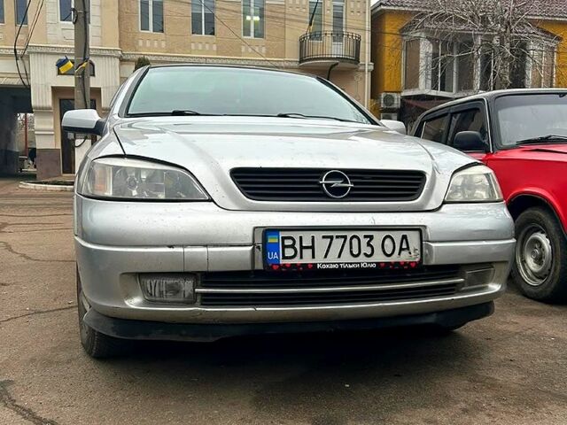 Серый Опель Астра, объемом двигателя 1.4 л и пробегом 350 тыс. км за 3000 $, фото 1 на Automoto.ua