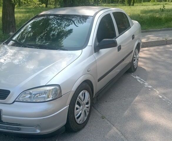 Серый Опель Астра, объемом двигателя 2 л и пробегом 230 тыс. км за 3400 $, фото 1 на Automoto.ua