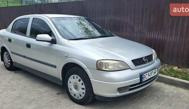 Серый Опель Астра, объемом двигателя 1.6 л и пробегом 248 тыс. км за 4000 $, фото 1 на Automoto.ua